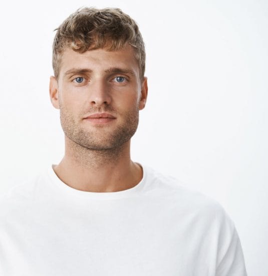 waist-up-shot-handsome-calm-blond-blue-eyed-guy-with-bristle-white-t-shirt-looking-front-with-relaxed-carefree-facial-expression-posing-gray-wall-looking-sincere-chill 1-1 waist-up-shot-handsome-calm-blond-blue-eyed-guy-with-bristle-white-t-shirt-looking-front-with-relaxed-carefree-facial-expression-posing-gray-wall-looking-sincere-chill 1-1
